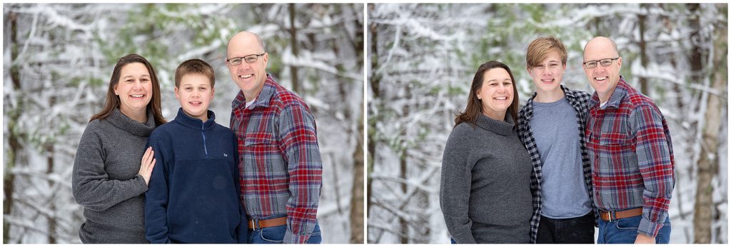 A family poses with snow covered trees behind them