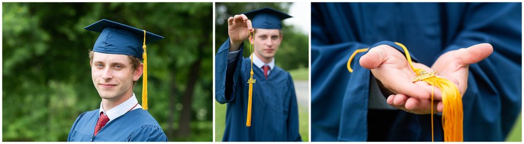 A high school graduate holds his tassel